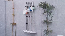 Video showing how to install multifunctional mop and broom wall hook in bathroom 